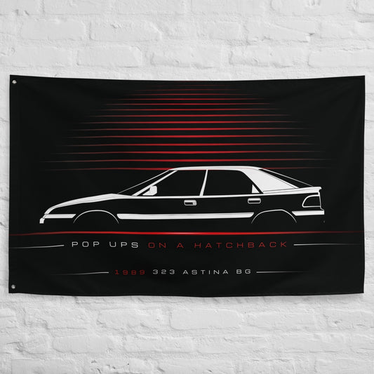 Mazda 323 Astina BG 1989 car silhouette flag - White Brick Wall